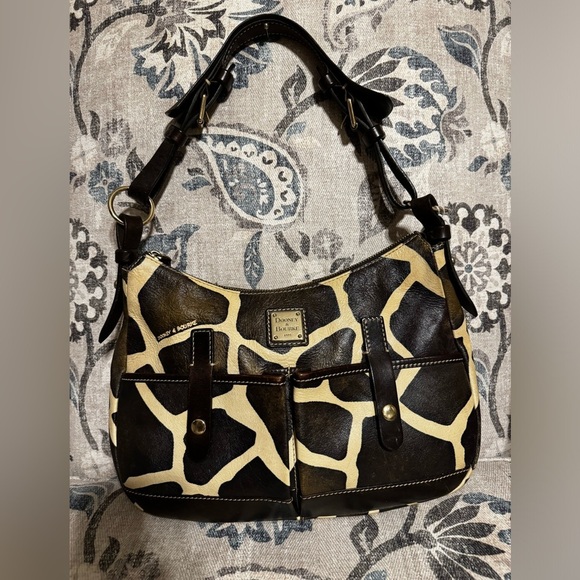Dooney & Bourke Handbags - Dooney and Bourke shoulder bag in a giraffe print style.